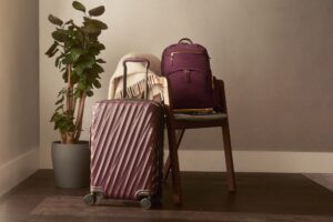 TUMI Launches Fall 2022 Collection Voyageur Carson Backpack in Beetroot/Emboss 19 Degree International Expandable Carry-On in Beetroot